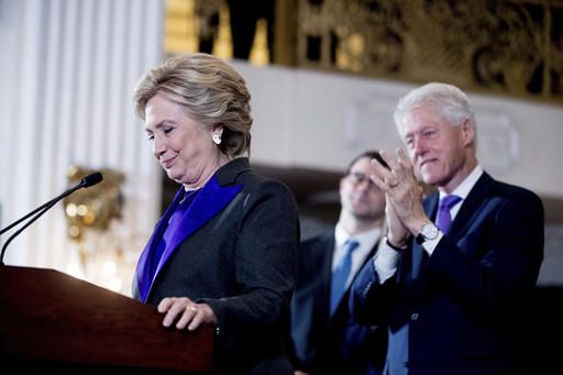 Hillary Clinton, accompanied by former President Bill Clinton, pauses while speaking to staff and supporters at the New Yorker Hotel in New York, Wednesday, Nov. 9, 2016, where she conceded her defeat to Republican Donald Trump after the hard-fought presidential election. (AP Photo/Andrew Harnik)