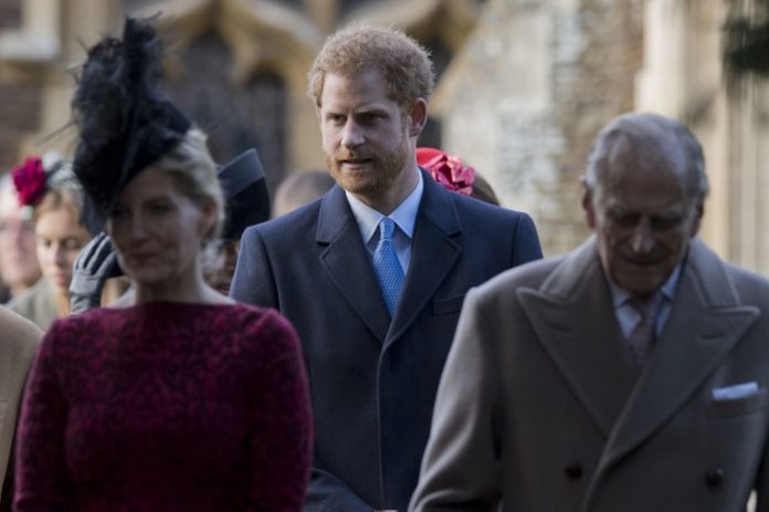 Sophie, Countess of Wessex (L), Britain's Prince Harry (L) and Prince Philip Duke of Edinburgh after attending a Christmas Day church service at St Mary Magdalene Church in Sandringham, Norfolk, eastern England on December 25, 2016. / AFP PHOTO / Justin TALLIS